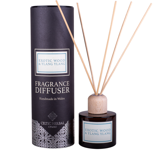 Exotic Wood & Ylang Reed Diffuser - blended to aid wellness and centre the mind, creating a soothing, balancing atmosphere.   Key info:  100ml  Ideal for Those Cold Winter Nights, Pure Essential Oils to Create a Warming & Spicy Room Scent.  Comforting, woody fragrance soothes the senses  Packaged in a luxurious tube - perfect for gifting  Handmade using Traditional, Artisan Methods in North Wales